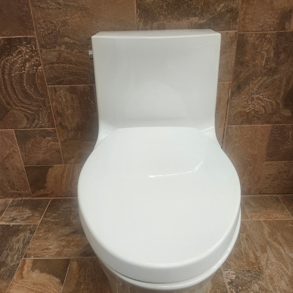 Kohler Veil 1pc Dual Flush Skirted White Toilet Floormodel Clearance as is M3 K1381