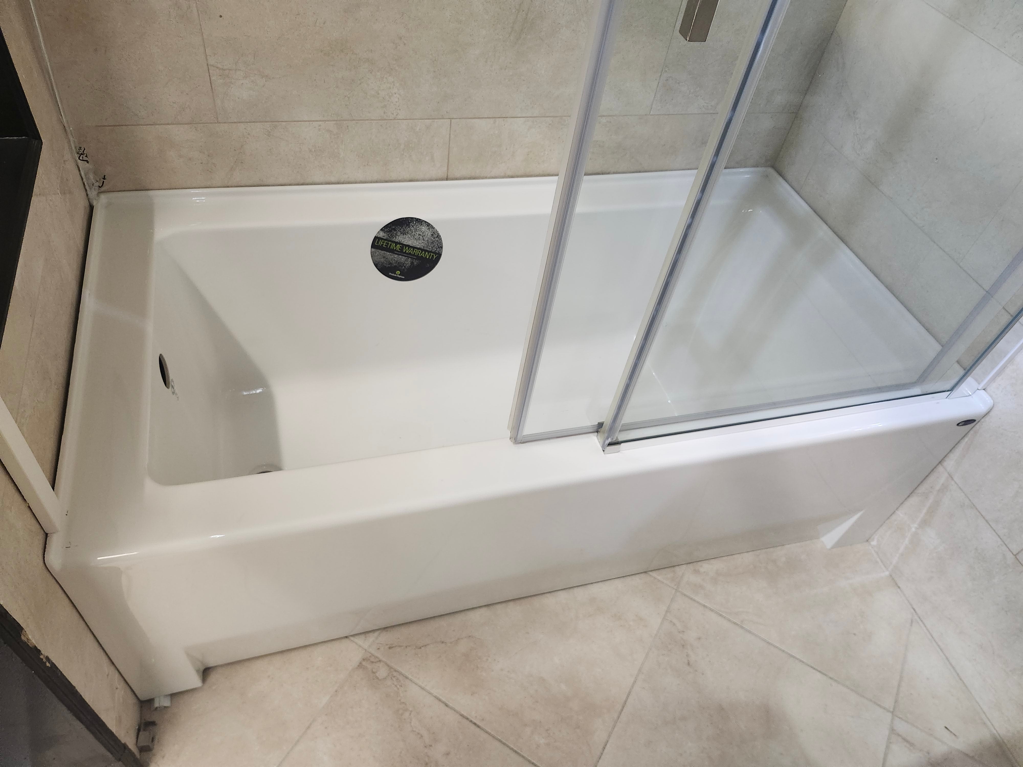 Fleurco Tub door and Hardware and 60x32 neptune bathtub (as is)