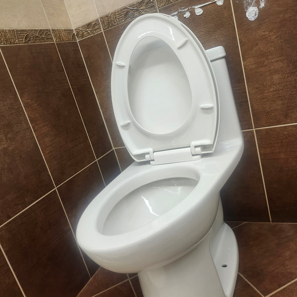 American Standard 1pc Elongated Toilet Floormodel Clearance as is (H9)2403128020