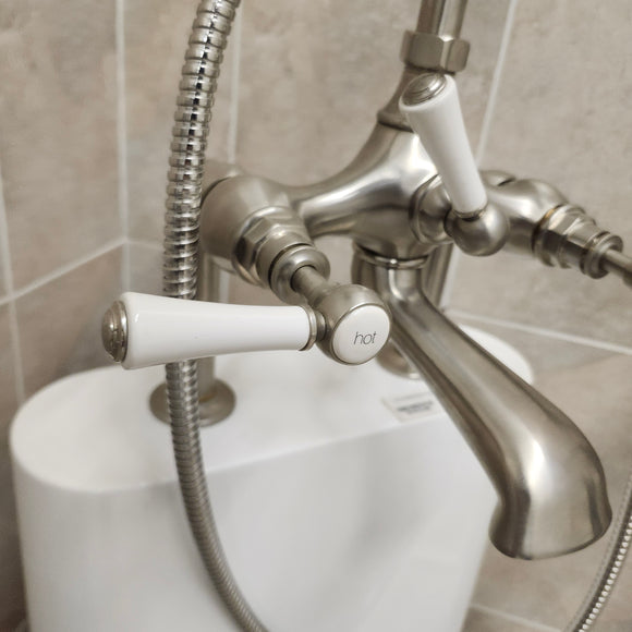 Bathtub Tub Filler Brushed Nickle with hand held shower head Floor model as is no valve included M8